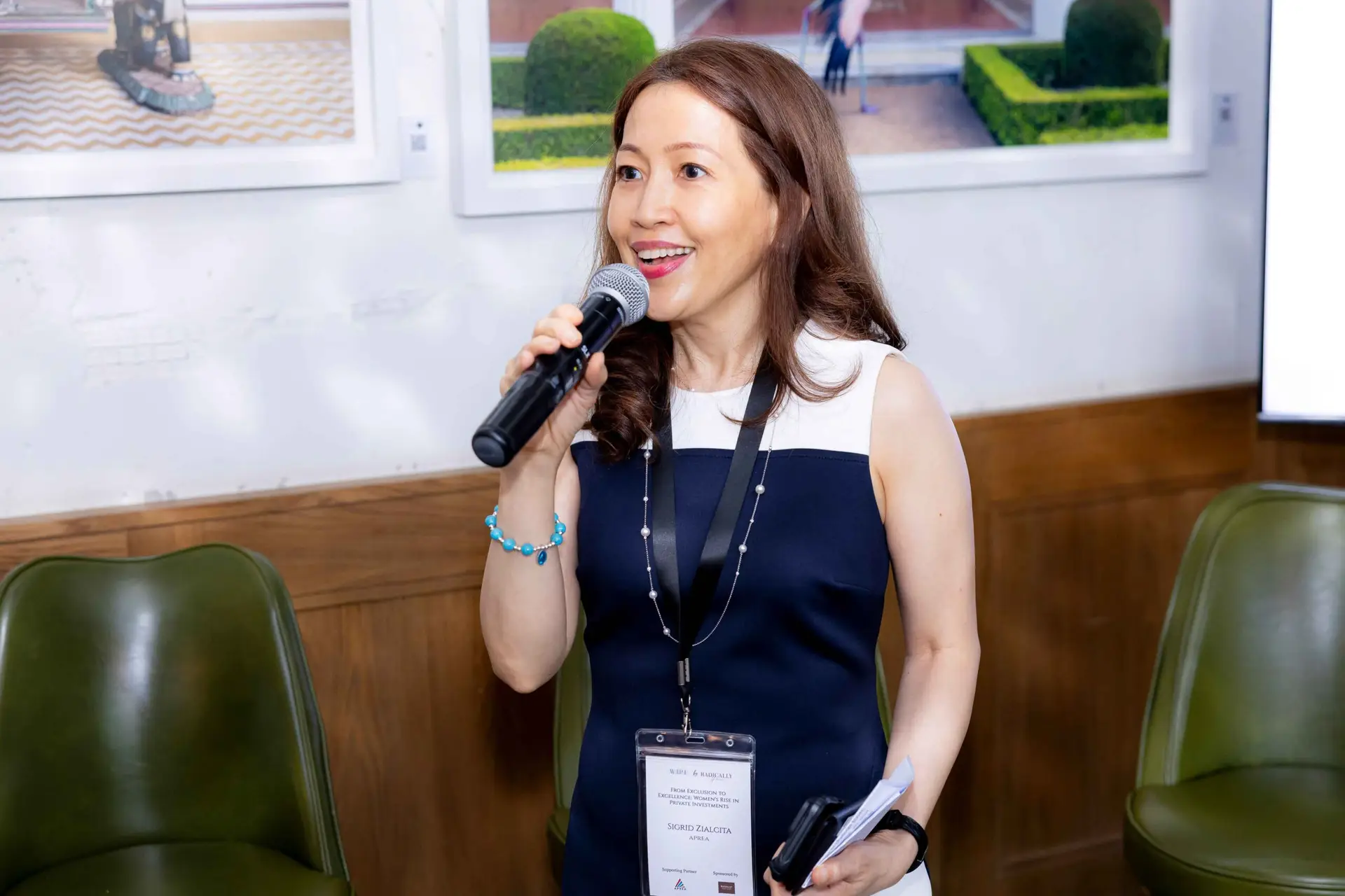 Conference speaker at podium 1