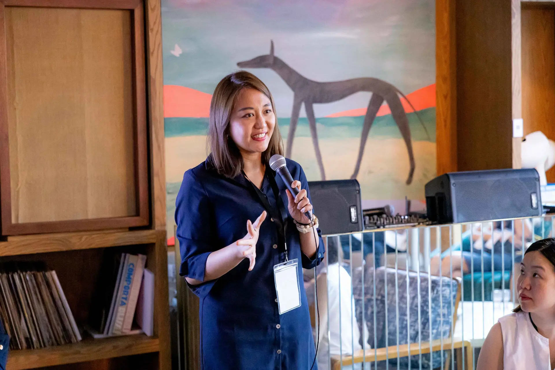Conference speaker at podium 51