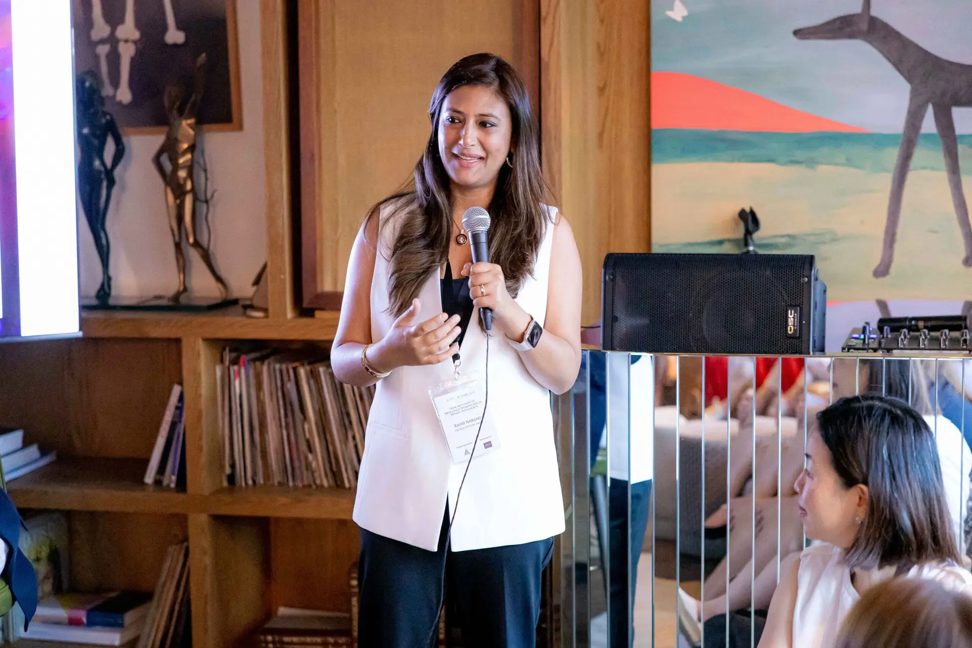 Conference speaker at podium 72