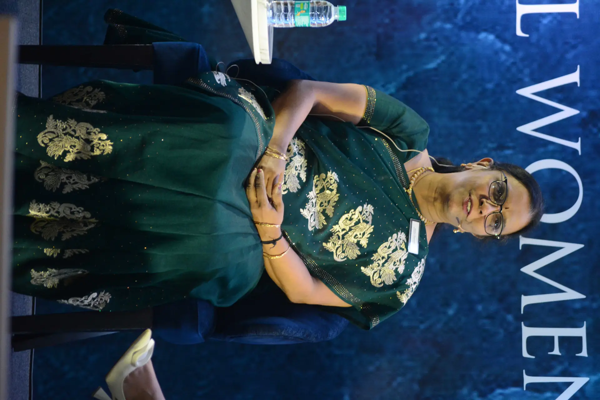 Conference speaker at podium 10