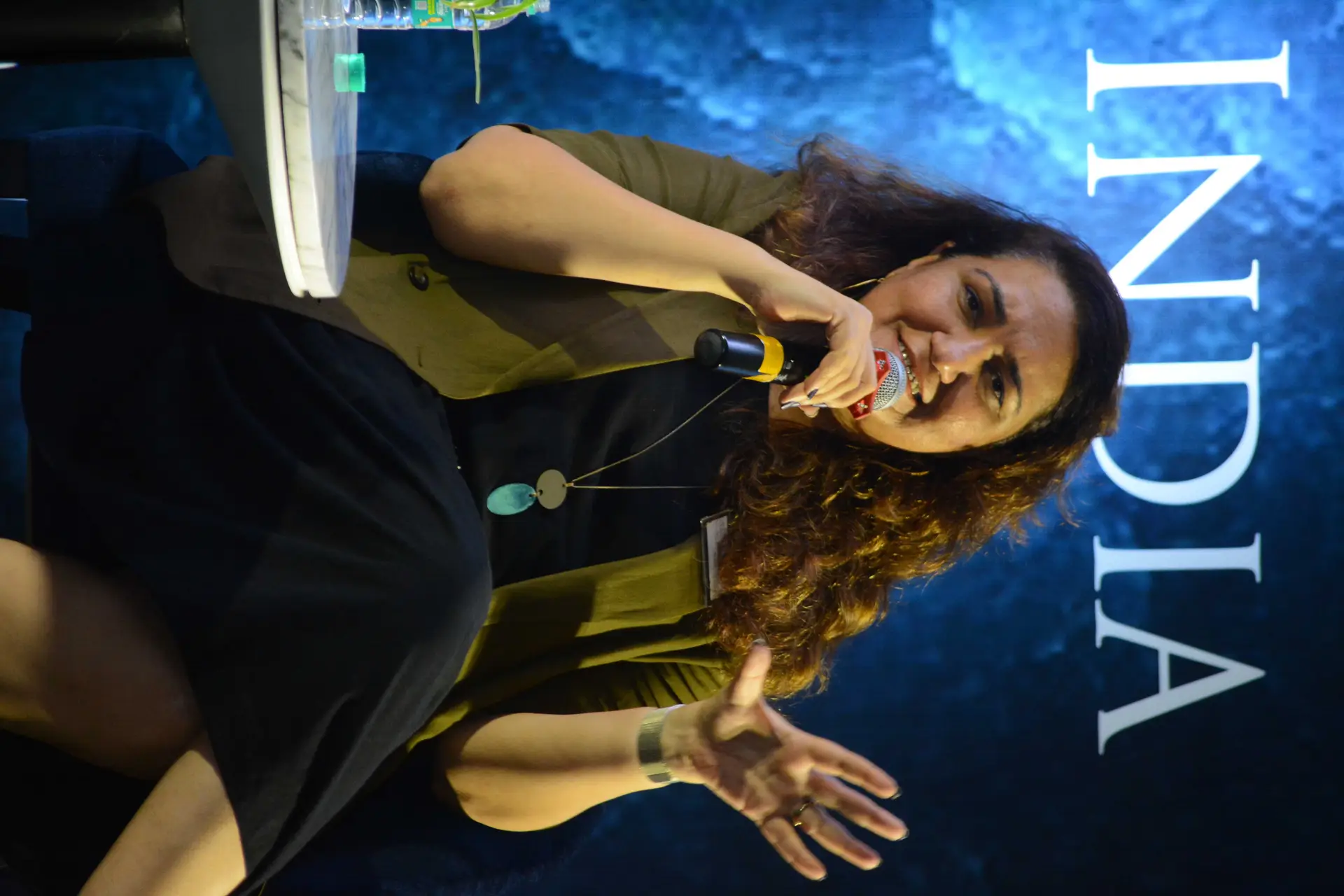 Conference speaker at podium 15