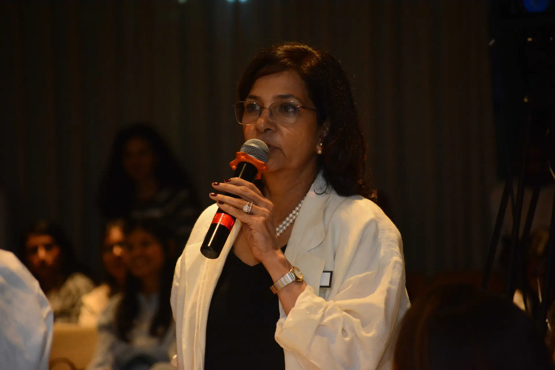 Conference speaker at podium 27