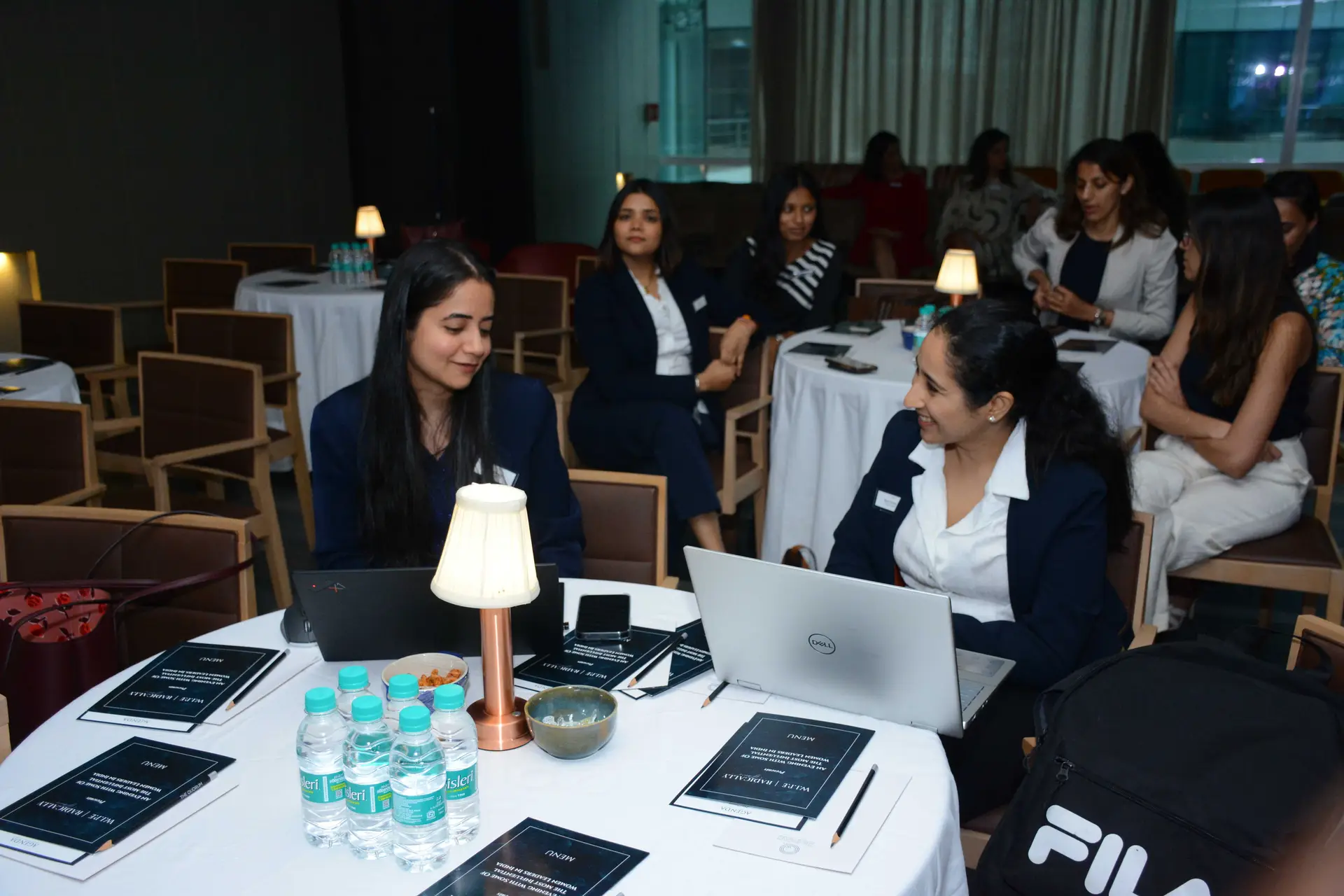 Conference speaker at podium 6