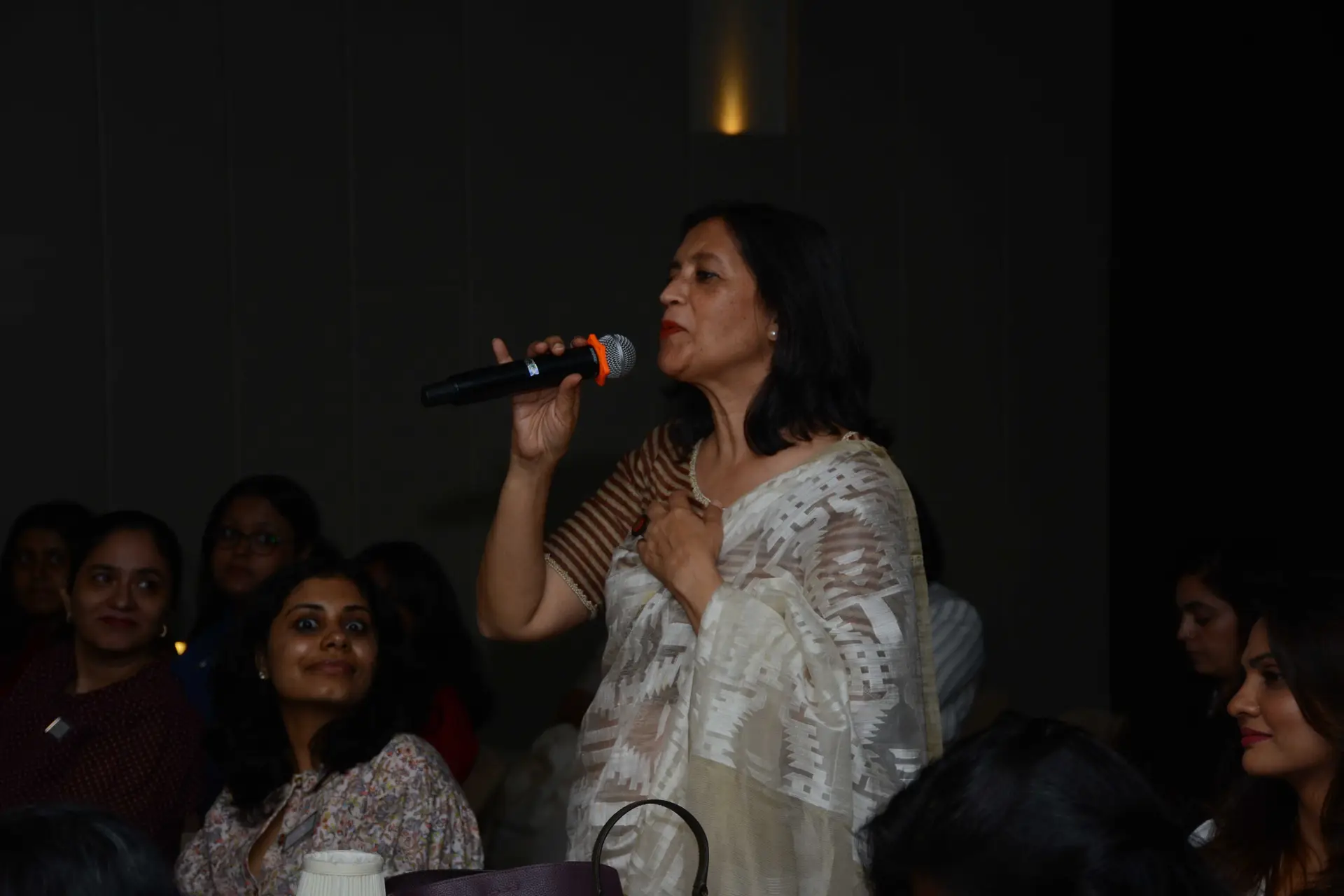 Conference speaker at podium 15