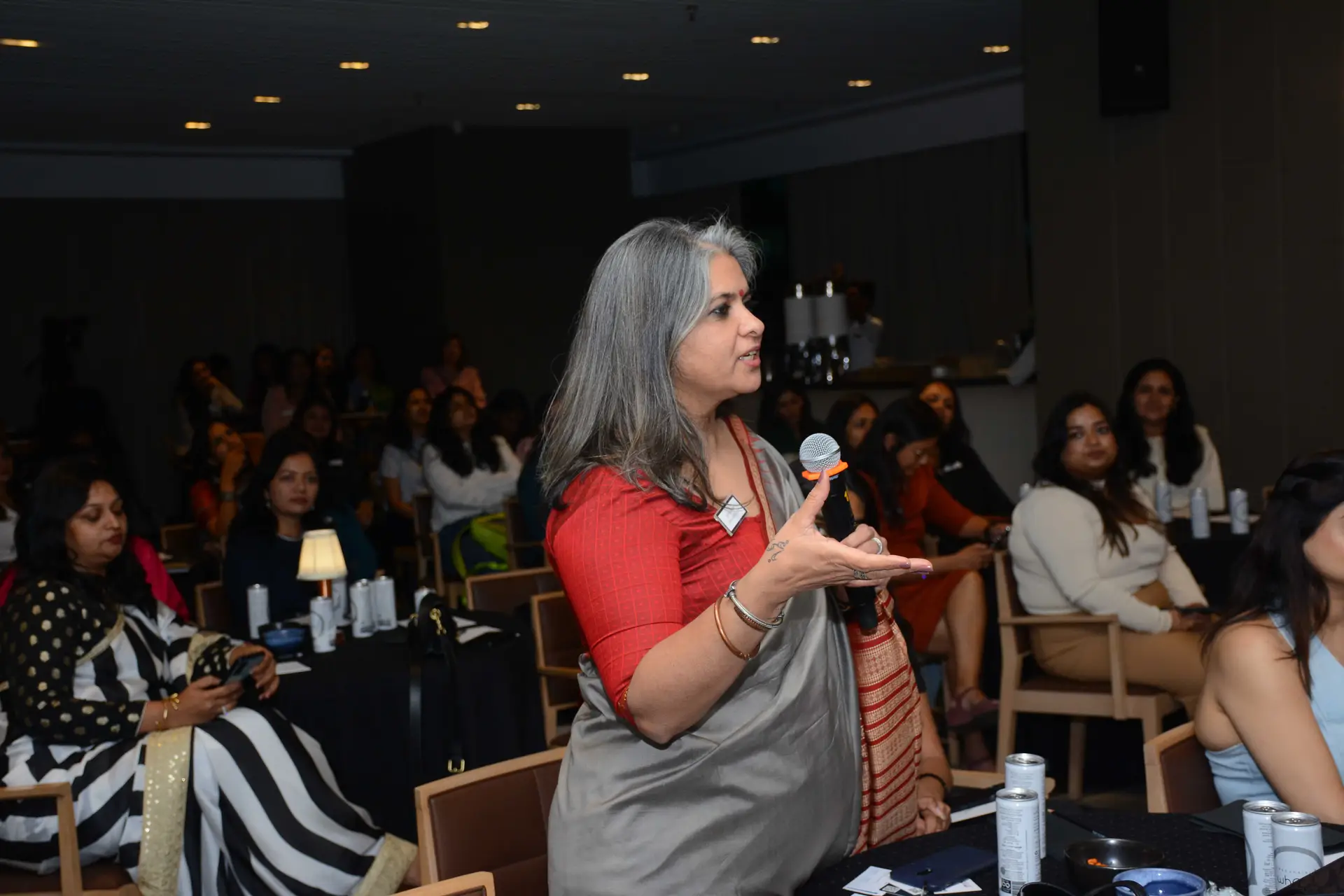 Conference speaker at podium 18
