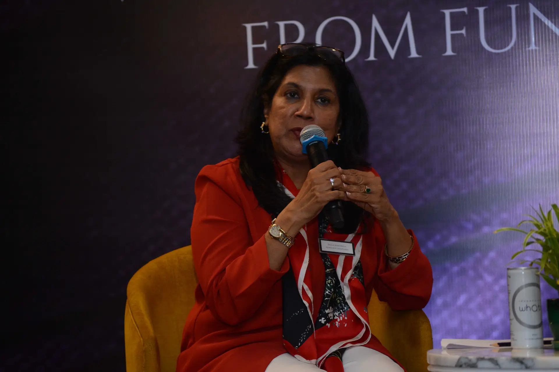 Conference speaker at podium 20