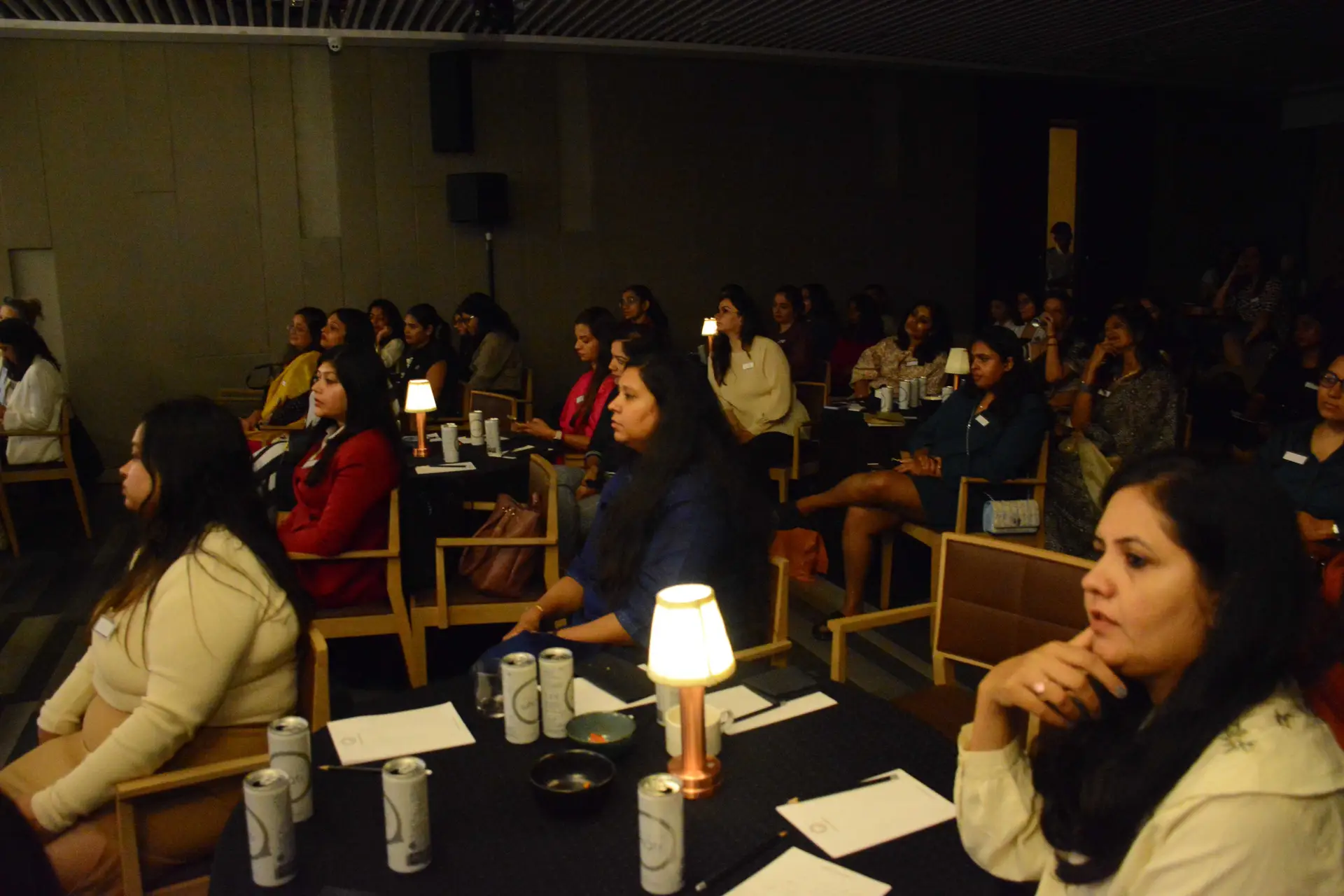 Conference speaker at podium 26