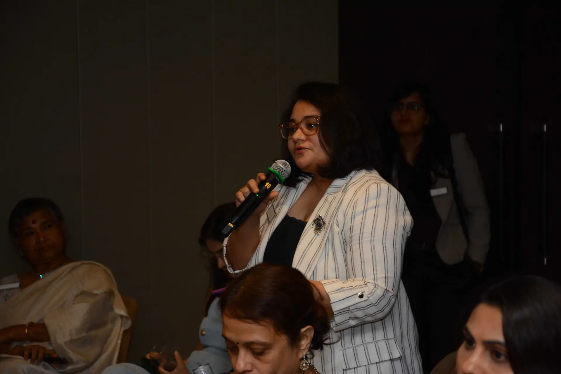 Conference speaker at podium 34